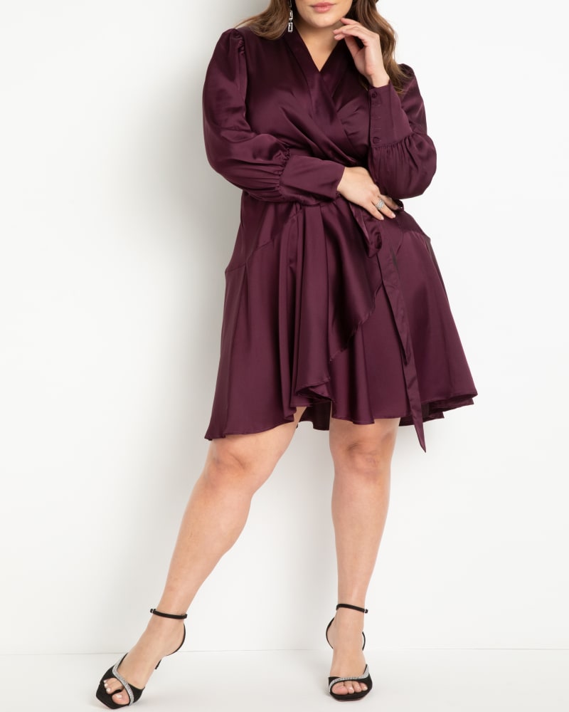 Front of a model wearing a size 28 Mini Satin Wrap Dress in Potent Purple by ELOQUII. | dia_product_style_image_id:272969